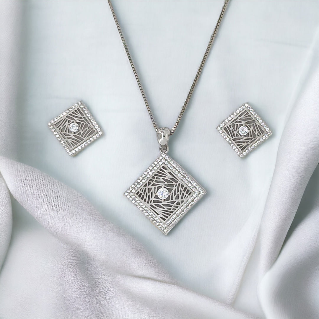 designer silver pendant with matching earring set with matte finish