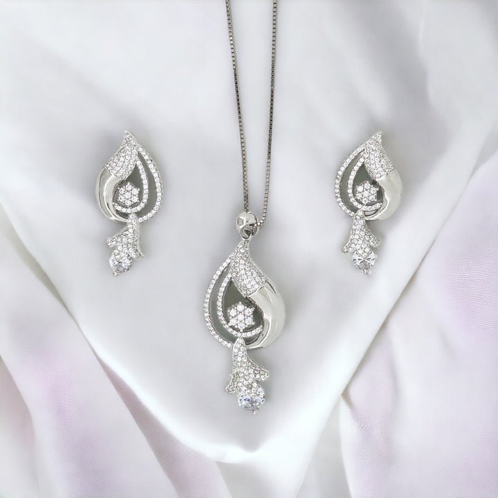 Beautiful designer silver pendant with matching earring set